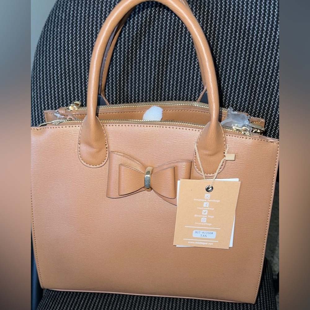 Never been used Bow Tie Bag